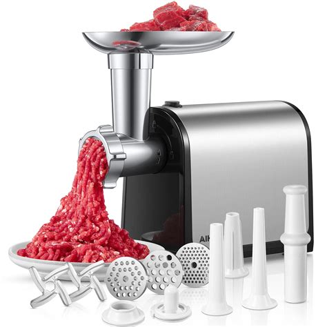 Set of essential butchery tools, including various knives, a meat grinder, and a sausage stuffer
