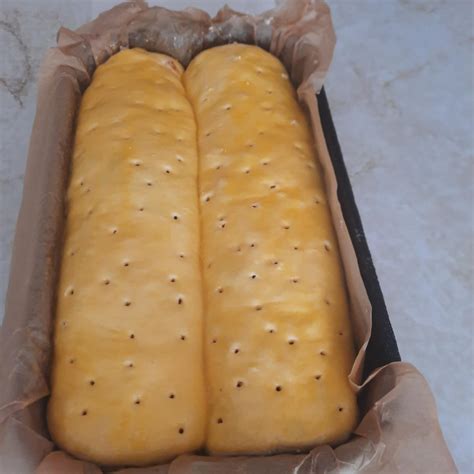 Fotografija baklava cheesecakea z nadevom iz skute in pudinga