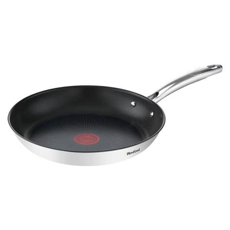 Shema konstrukcije ponve Tefal Intuition z označenimi ključnimi elementi (debelo dno, robovi za prelivanje, oznake za merjenje).