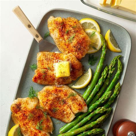 Photo of a serving suggestion with baked fish and sides