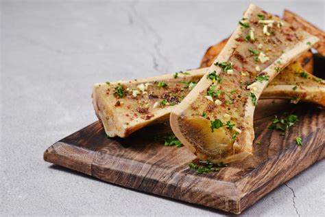 Thematic photo of bone marrow, beef cheeks or sweetbreads dish