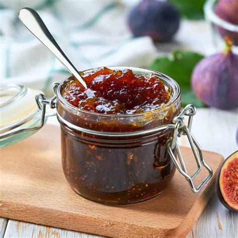 Photo of a wooden table with baked fig jam