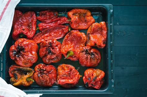Thematic photo of roasted red peppers and eggplants on a baking tray