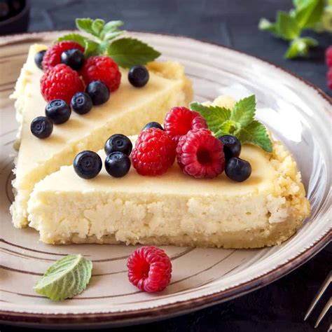 Thematic photo of a slice of cottage cheese cake with berries