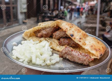 Thematic photo of Bosnian cevapi on a grill