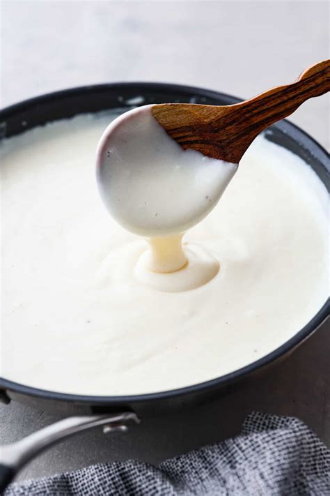 creamy bechamel sauce in a saucepan