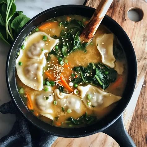 Photo of spinach soup with ham dumplings
