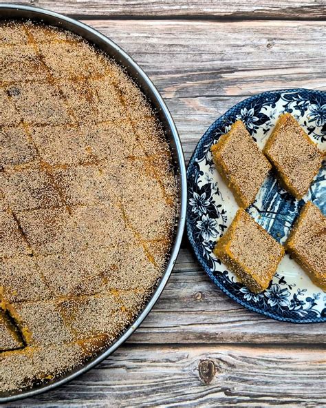 Thematic photo of a pumpkin semolina cake cut into squares, ready to serve
