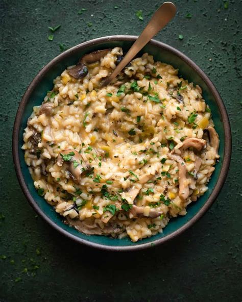 A flat lay image showing all the fresh ingredients for vegan paella style risotto