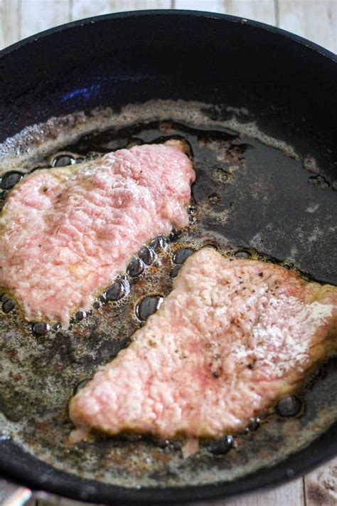 Photo of cutlets searing in a heavy pan