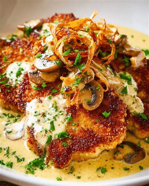 Photo of a finished dish of cutlets in a rich pan sauce