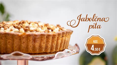 Prikaz vitrine s svežimi sladicami in tortami v slaščičarni Lenček.