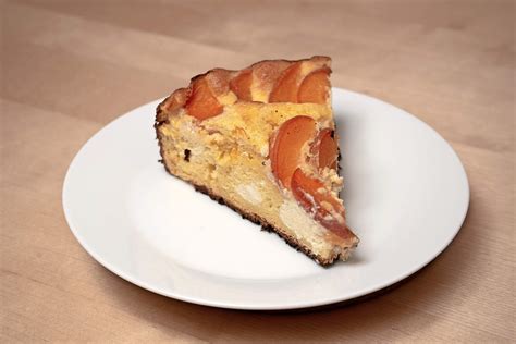 slika sočnega pomarančnega skutnega kolača