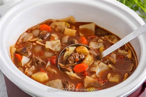 Thematic photo of a large pot of stew with pasta and cabbage