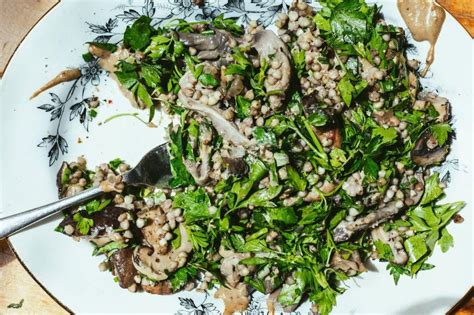 Table with fresh ingredients for buckwheat and mushrooms