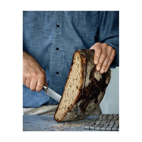 Tematska fotografija ročno kovanega noža za kruh