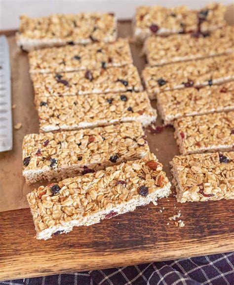 Thematic photo of children making granola bars with an adult