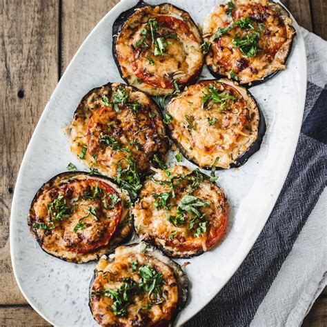 Thematic photo of baked eggplant with mozzarella and tomato sauce