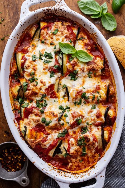 Photo of baked eggplant rolls with melted cheese