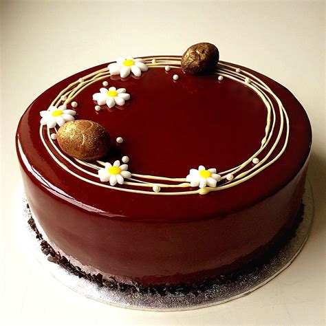 Image showing chocolate glaze and white chocolate decoration on a cake