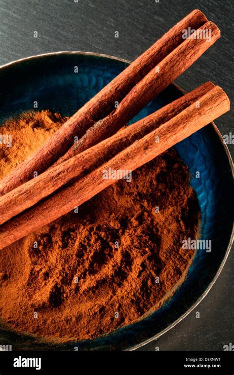 Cinnamon sticks and ground cinnamon thematic photo