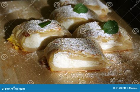 Thematic photo of autumn leaves and a slice of healthy cottage cheese strudel