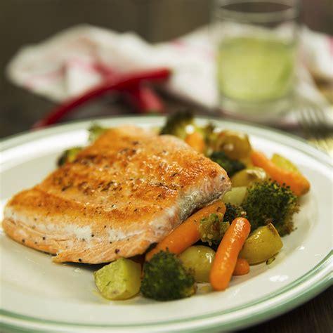 Thematic photo: Baked salmon with vegetables in the oven