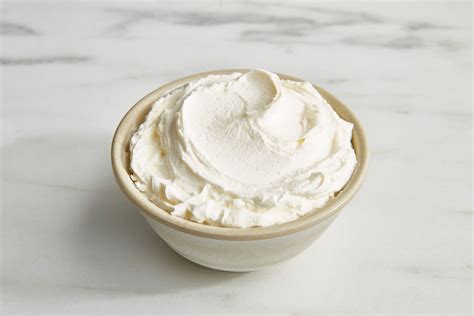 Thematic photo of fresh organic oranges and mascarpone cheese