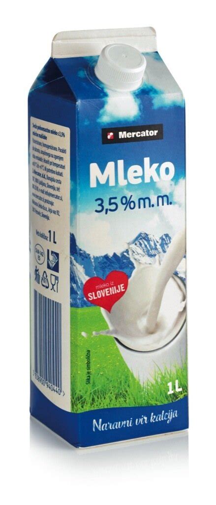 Sveže mleko v posodi z nabrano plastjo smetane na vrhu