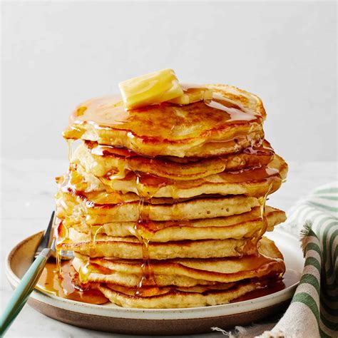 The image should show gratinized pancakes in a baking dish, freshly taken out of the oven, with a golden-brown top.