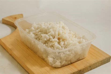 Thematic photo of cooked rice stored in a container