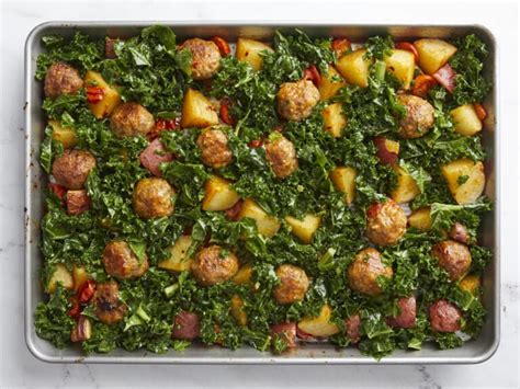 Photo of a pan with kale and potatoes stewing