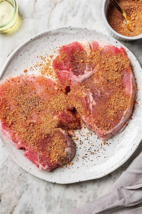 Image of seasoned pork ready for searing