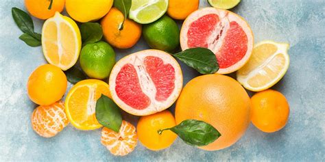 Prikaz sestavin: narezane buče, sveži citrusi (limone in pomaranče), sladkor in začimbe