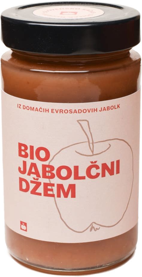 Jabolčni džem s pikantnimi čiliji v kozarcu, okrašeno s cimetovimi palčkami