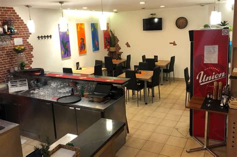 Notranjost Pizzerije La Pizza v Mariboru ali fotografija ene izmed njihovih pic