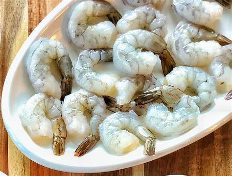 Thematic photo of cleaned raw shrimp tails
