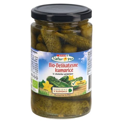 Kumarice v kozarcih, prelite s slanico in začimbami