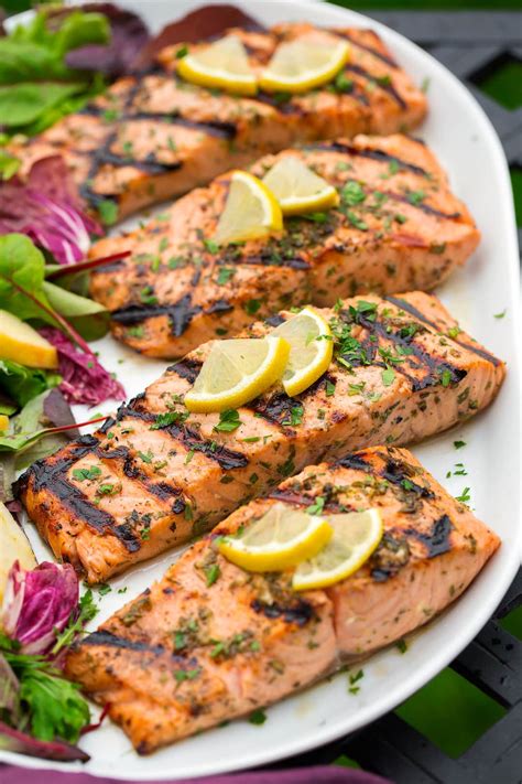 Photo of grilled salmon with lemon and herbs