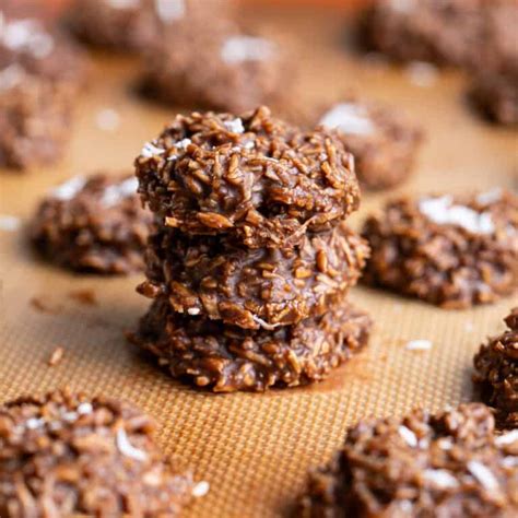 Photo of no-bake semolina coconut chocolate cubes, dusted with coconut flakes