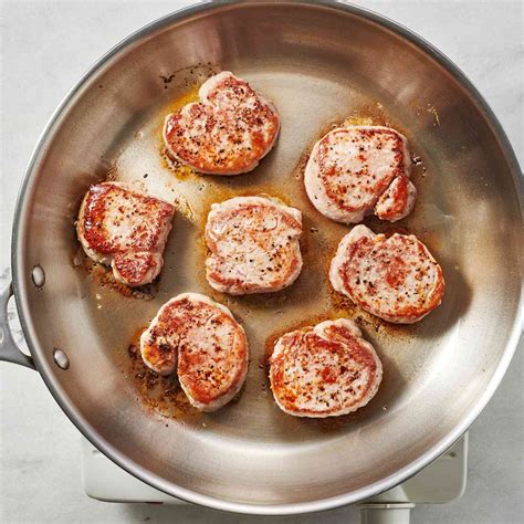 Thematic photo of pan-seared pork tenderloin medallions