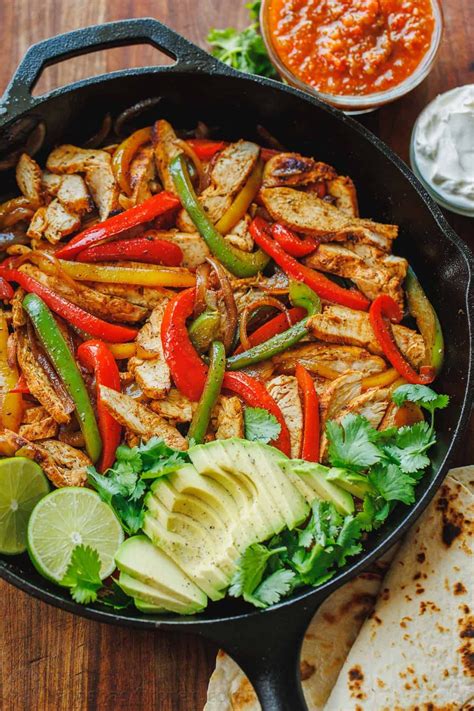 Photo of assembled fajita tortillas with various fillings