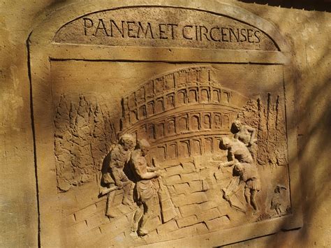 ilustracija Panem et circenses s kruhom in gledališčem