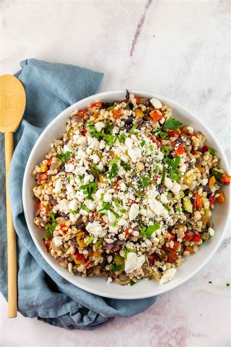 Thematic photo of a colorful barley salad in a bowl