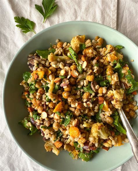Photo of a barley salad with roasted vegetables and croutons