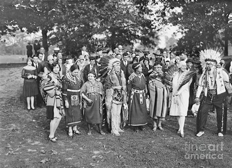 Historical illustration of Native Americans gathering blueberries.