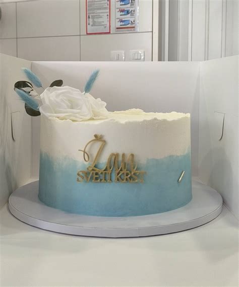 Tematska fotografija krstne torte z angelčkom