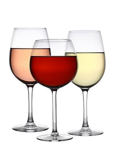 Kozarec suhega belega vina ob sestavinah za rižoto
