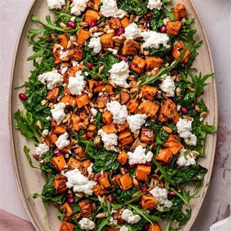 Photo of roasted potato salad with goat cheese and arugula