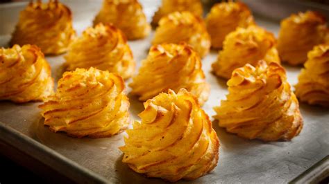 Piped Duchess potato mounds (Pommes Duchesse)